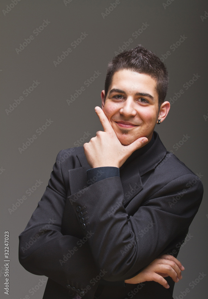 Teenaged businessman ready to rock the world Teenaged businessman ready to rock the world