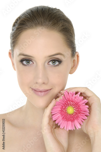 Face of beautiful girl with sunflower-close up