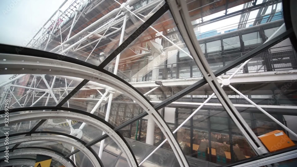 elevator lift up, backdrop building with wall of glass elevator lift up, backdrop building with wall of glass