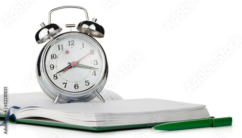 Alarm clock on notepad