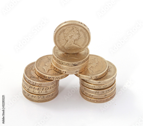 British, UK, pound coinsn on a plain white background. photo