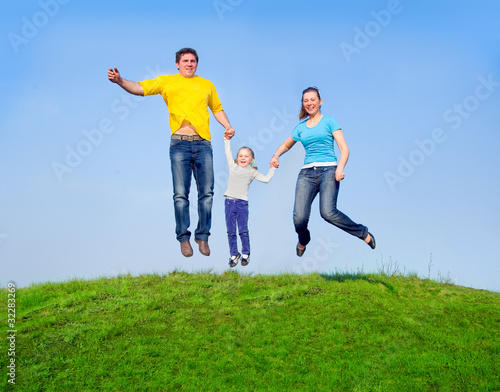 Happy family in the jump
