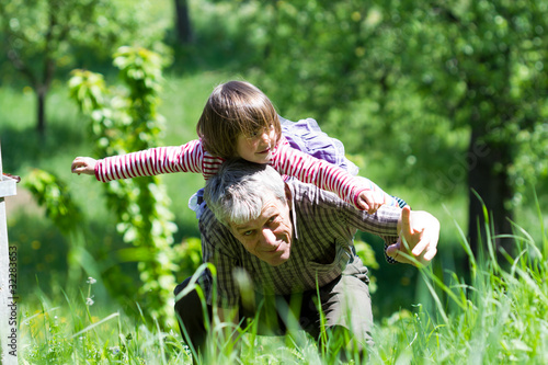 grandfather with baby outdoor