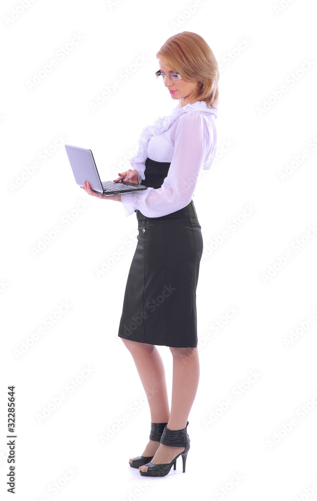 A young businesswoman in formal clothes with a laptop A young businesswoman in formal clothes with a laptop