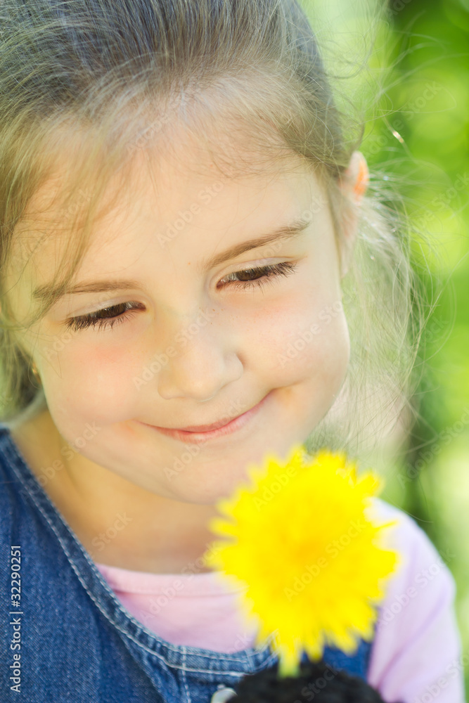 Little girl with yellow dandelion Little girl with yellow dandelion