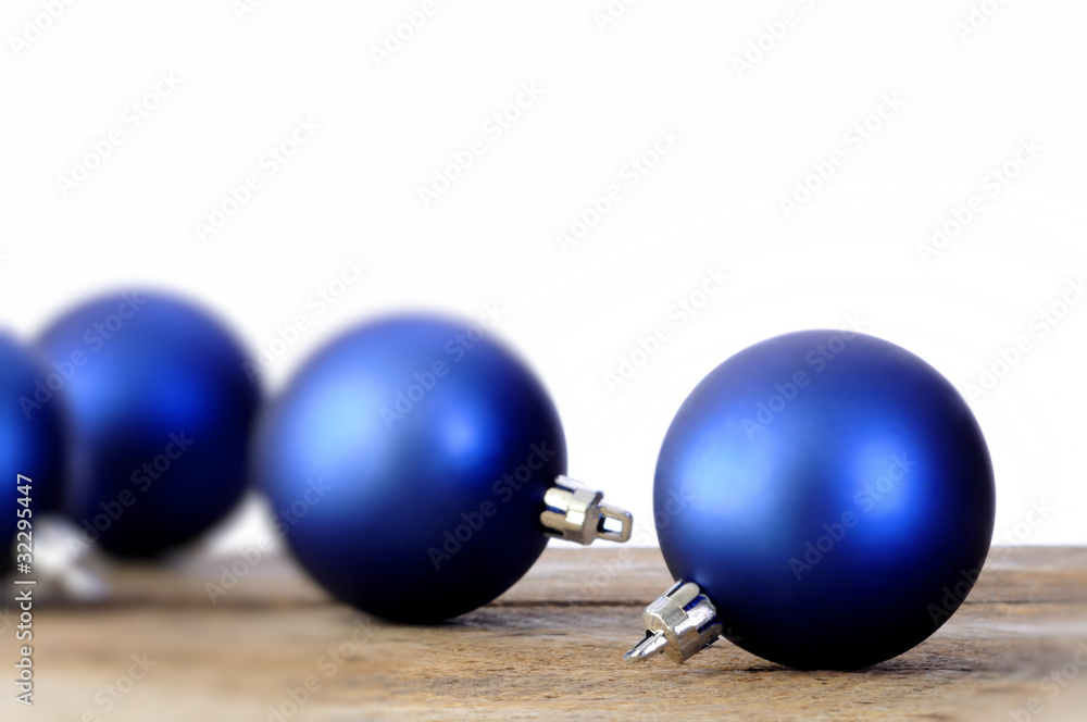 Red and blue Christmas balls on an old vintage table Red and blue Christmas balls on an old vintage table