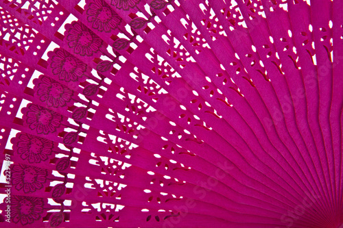 Close up Wooden oriental chinese fan isolated on white backgroun