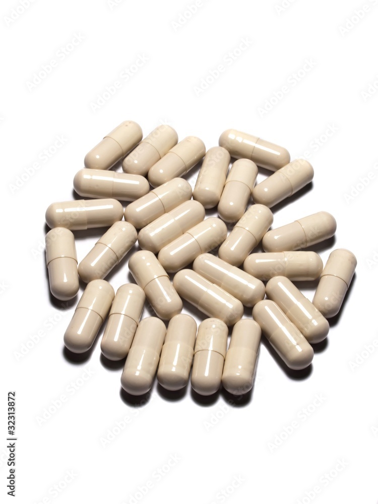 White capsules on Isolated white background