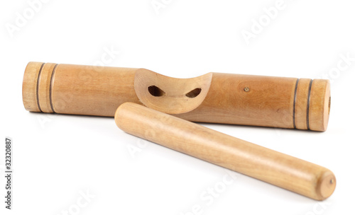 Billede på lærred Wooden claves isolated on a white background.