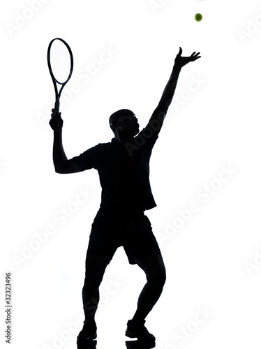 man tennis player at service
