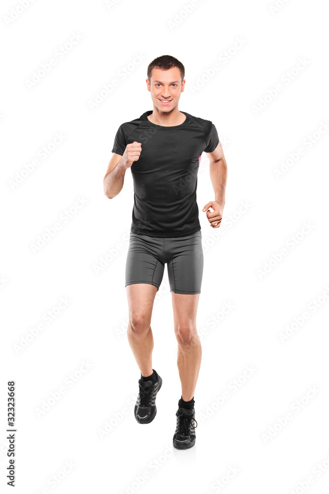 Full length portrait of a male athlete running Full length portrait of a male athlete running