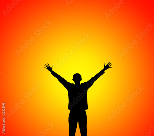 Man lifting hands to sunset