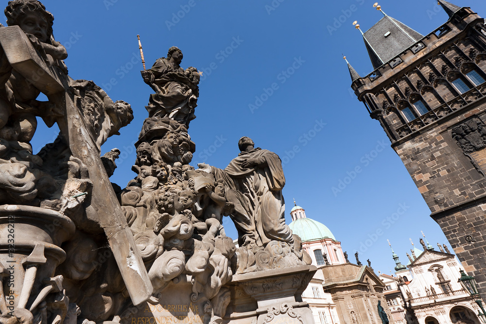 Obraz premium Statue and Tower on Charles Bridge Prague Czech Republic.