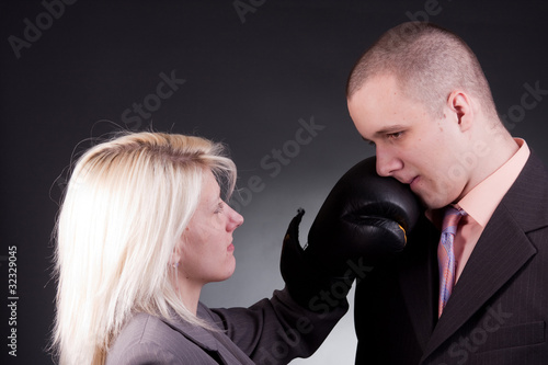 businesswoman hit businessman photo