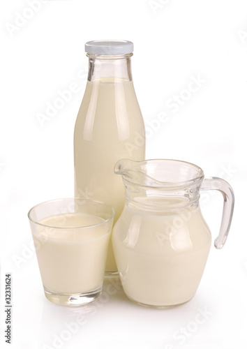 glass bottle and a jug of milk