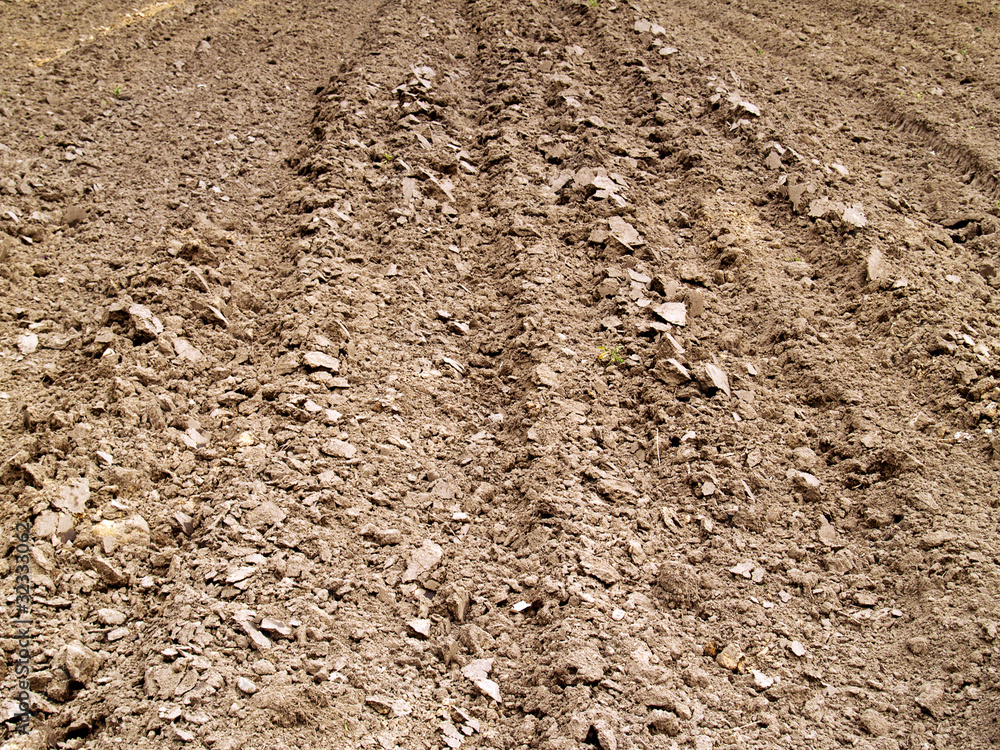 texture of plowed soil rows background texture of plowed soil rows background