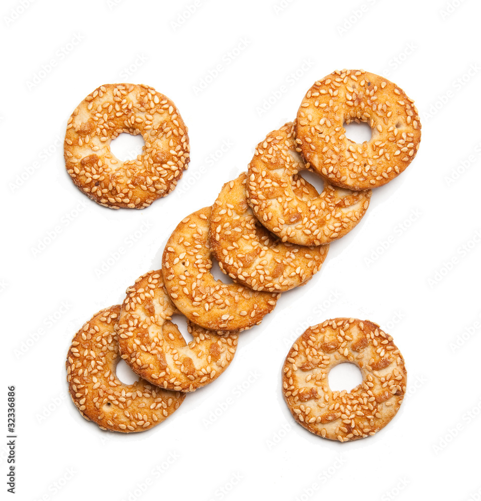 sesame cakes on white background. the form of percent