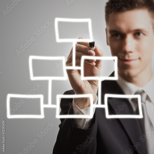 young businessman drawing diagram photo