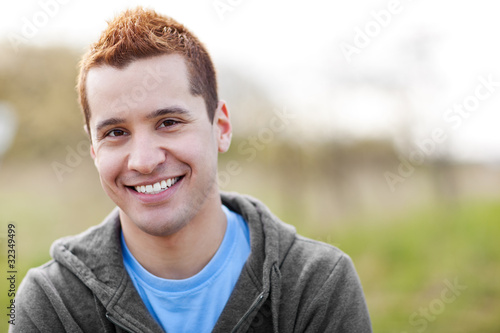 Mixed race man smiling