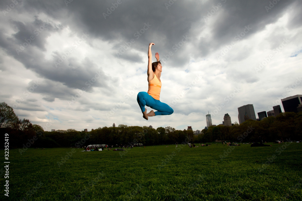 Young pretty woman in Yellow top in Central Park Young pretty woman in Yellow top in Central Park