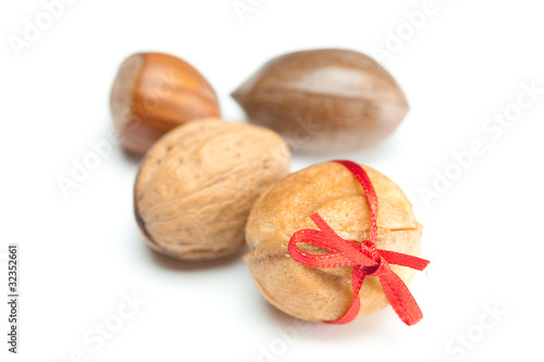 cake nut and ribbon isolated on white