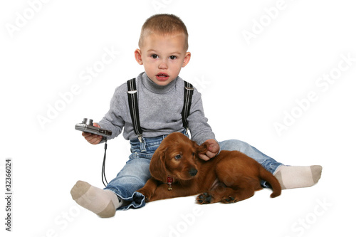 kid wiht puppy