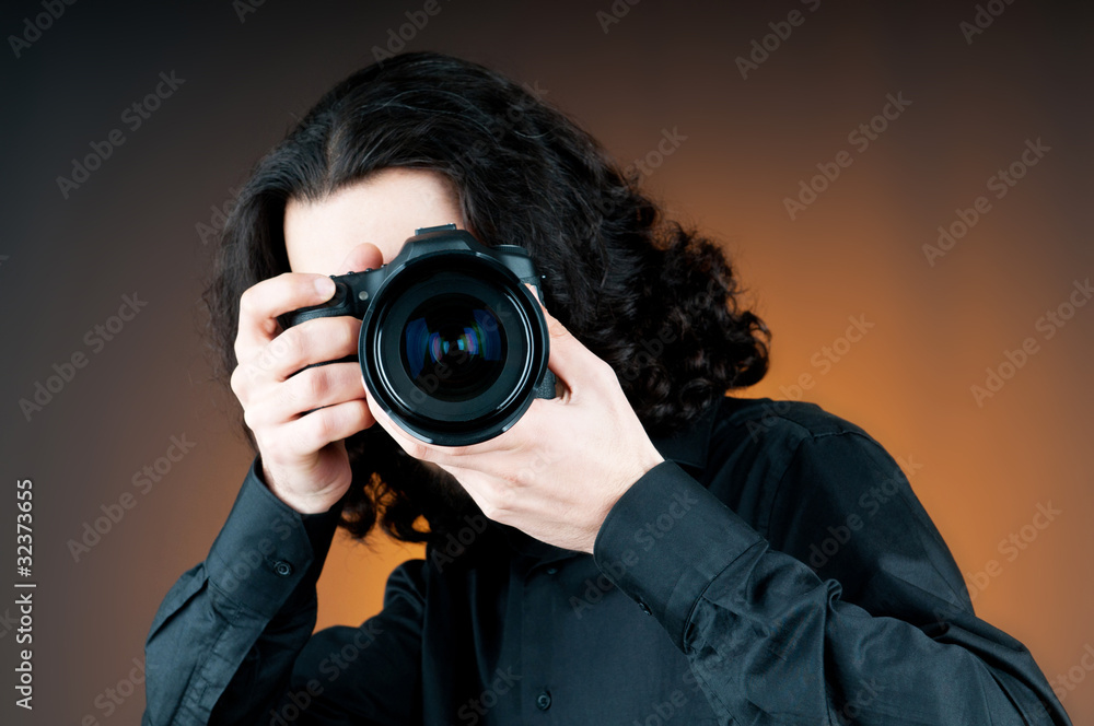 Photographer with the digital camera Photographer with the digital camera