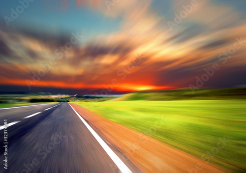 Blurred Road with blurred sky and sunset © grthirteen