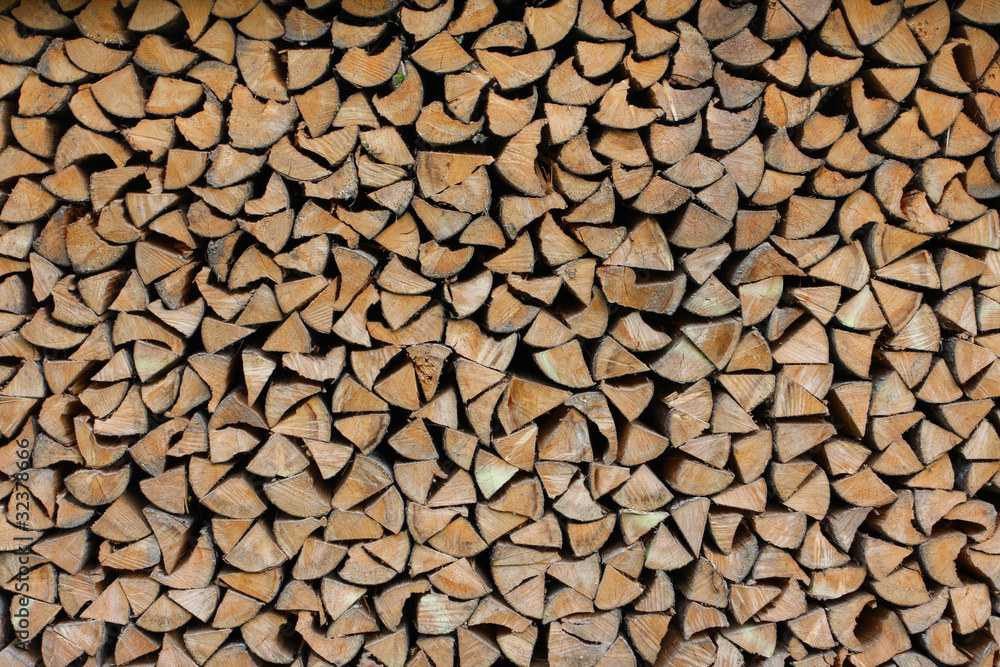 background made of cumulate firewood close up background made of cumulate firewood close up