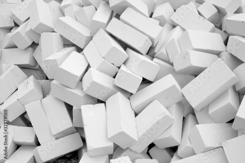 Foto A large pile of white bricks