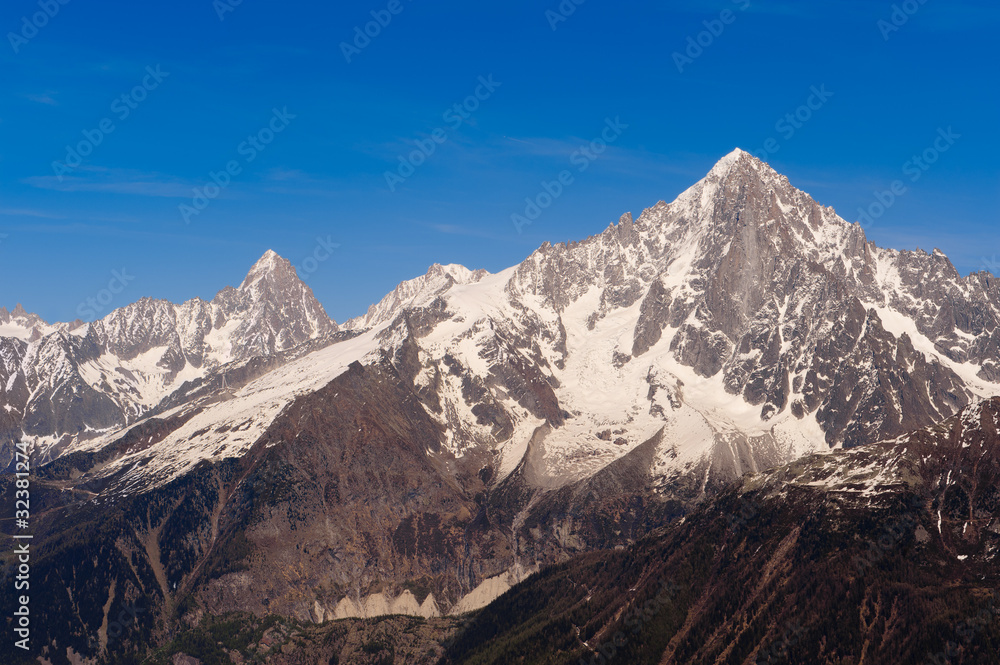 Snowbound mountain peaks. French Alps over Chamonix valley