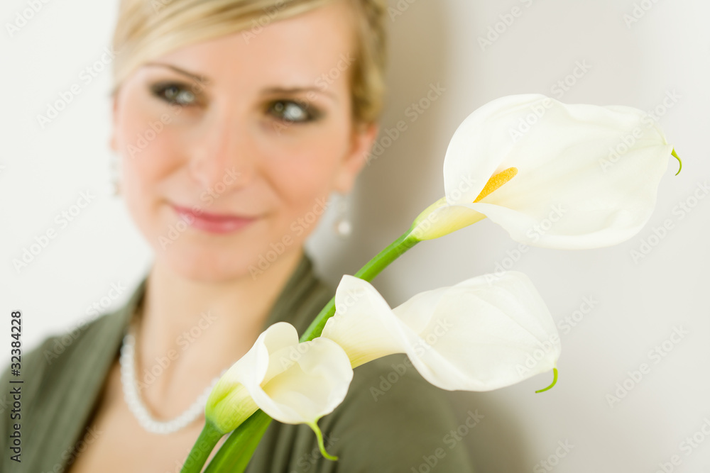 Portrait of calla lily flower woman in background Portrait of calla lily flower woman in background