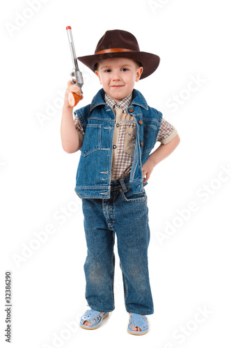 little boy wearing a cowboy hat