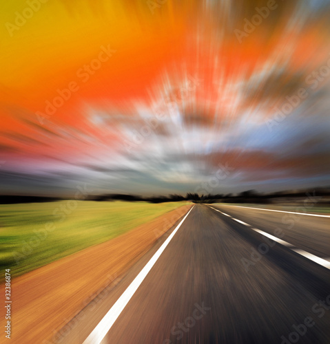 blured road and blue sky © grthirteen