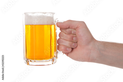 Hand with glass of beer