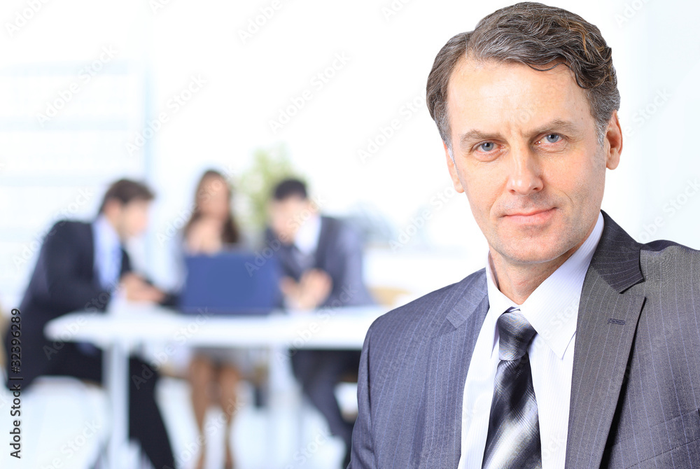 senior businessman in office senior businessman in office