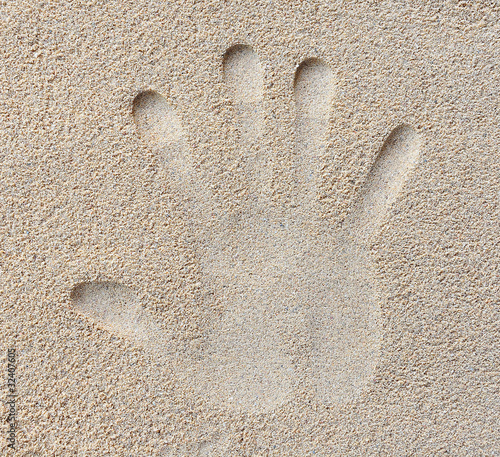 hand print in sand