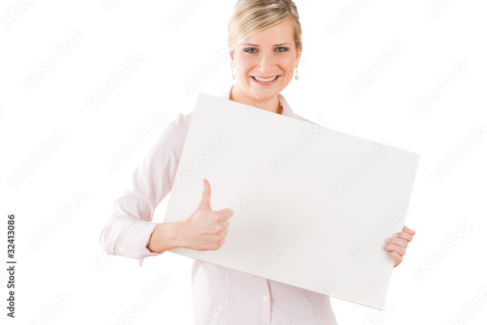 Happy businesswoman behind empty banner thumbs up Happy businesswoman behind empty banner thumbs up