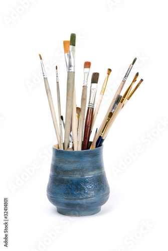 brushes in vase