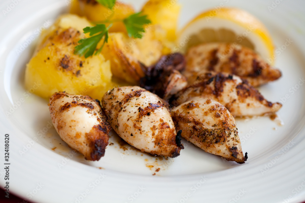 Delicious grilled squids, Greece Delicious grilled squids, Greece