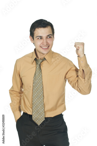 Businessman in suit shows an emotional YEAH!