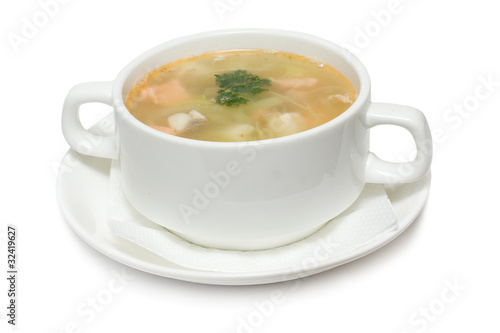 Soup with seafood isolated on white
