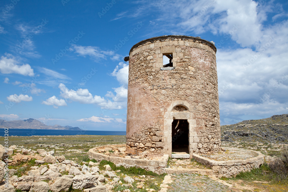 Old windmill against a striking sky