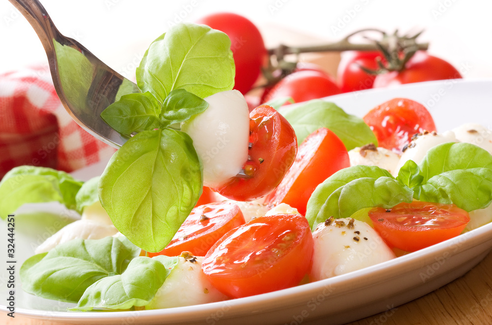 salad with mozzarella, basil and tomatoes