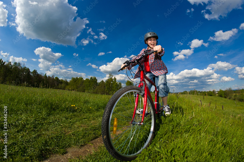 Cyclist - boy riding bike
