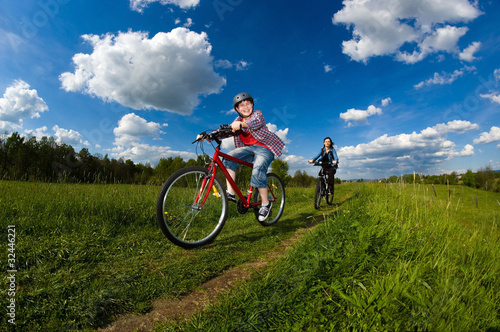 Mother and son riding bikes