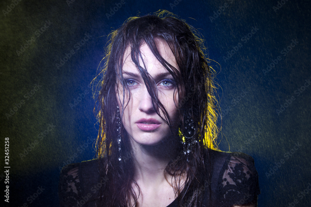 Fine art portrait of wet hair female under spots of rain. Stock Photo |  Adobe Stock