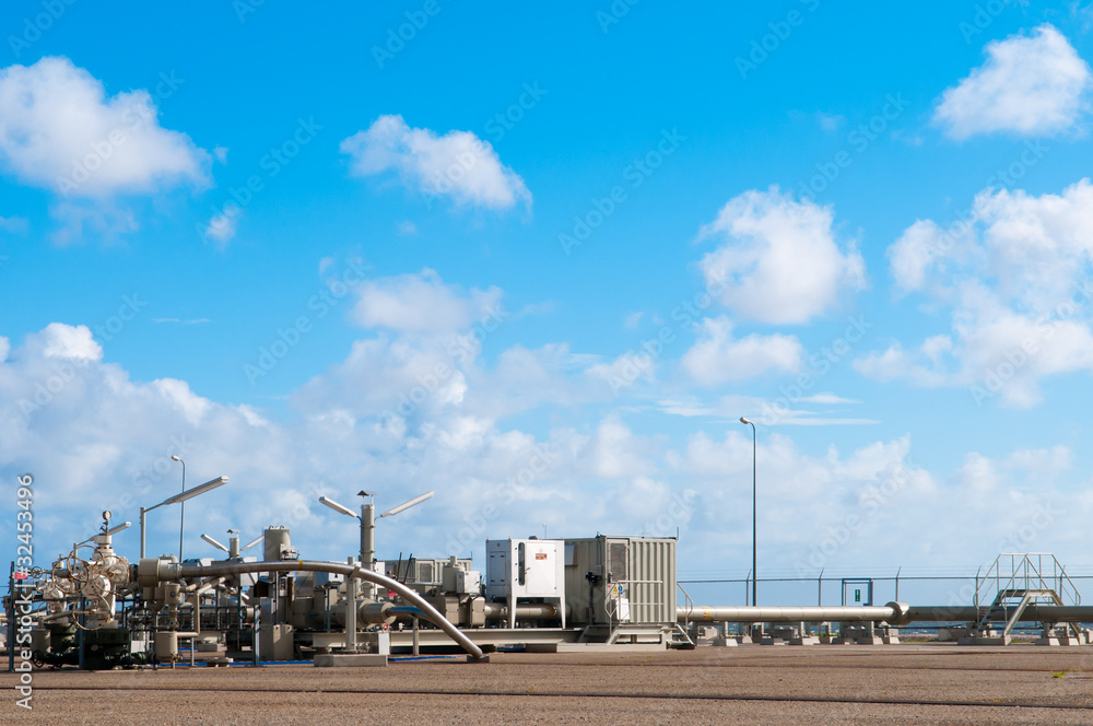 Obraz premium gas production well and blue sky