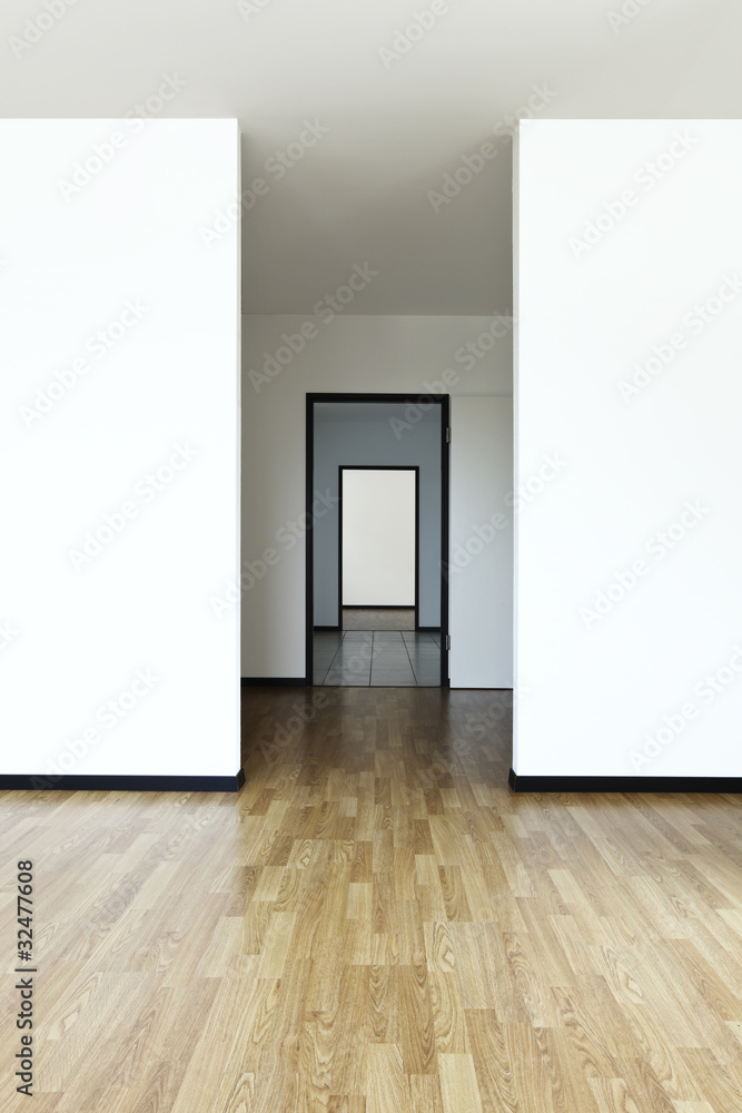 empty room with hardwood floor empty room with hardwood floor