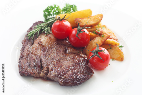 Steak with Potato Wedges photo